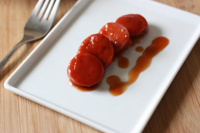 Kentucky Bourbon Dogs | Fake Food Free | Sliced grass-fed hotdogs slow cooked in a sauce spiked with bourbon. 