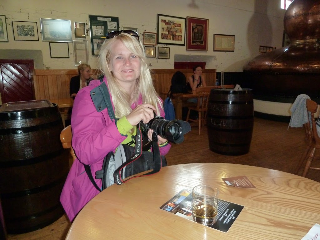 Taking photos of whiskey at Bushmills