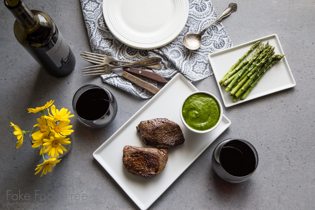 These grass fed sirloin steaks are topped with spinach horseradish pesto! | Recipe at Fake Food Free | Pairing with Cultivar Wine #partner #cultivarwinebloggers