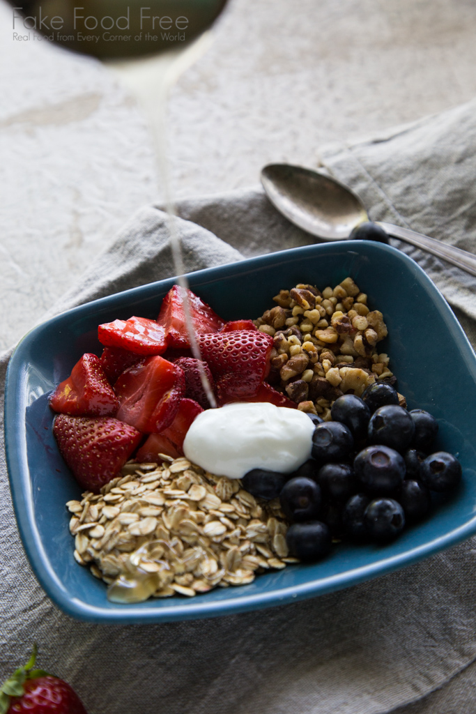 Roasted Strawberry and Oat Breakfast Bowl with Walnuts, Blueberries and Honey | Fake Food Free