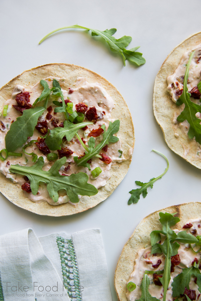 Arugula Sundried Tomato Tostada Recipe | FakeFoodFree.com