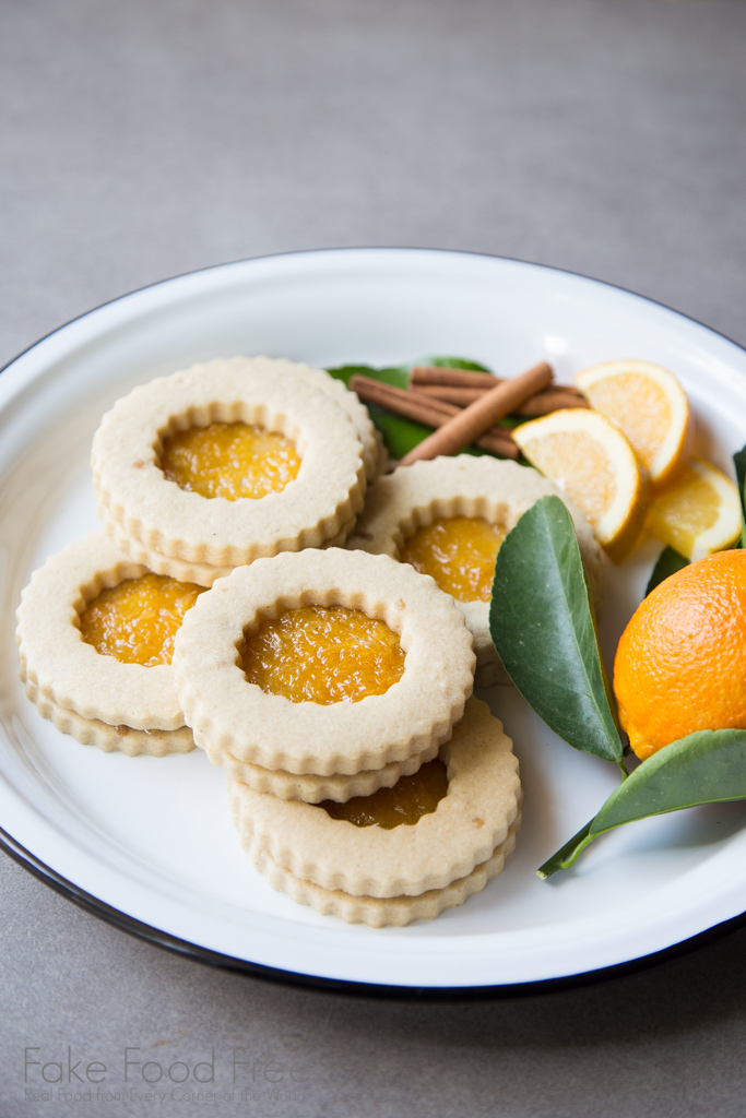 A recipe for festive cookies with ginger and rum, filled with orange jam. | FakeFoodFree.com