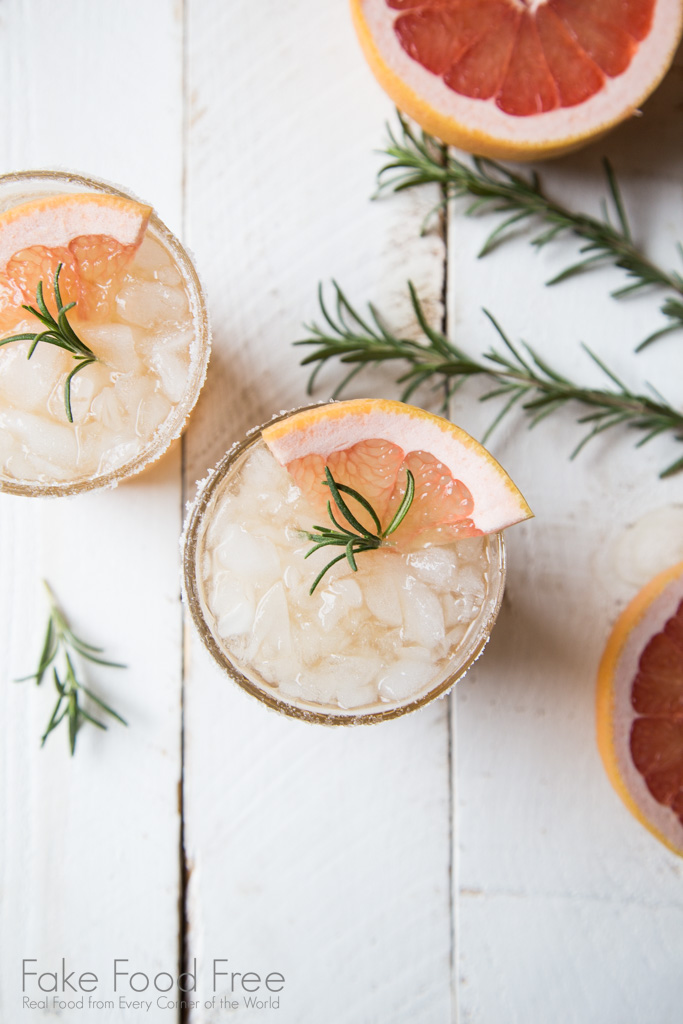 A twist on the Salty Dog Cocktail. This drink uses rosemary infused raw sugar simple syrup and combines with red grapefruit juice and vodka. | Find it at FakeFoodFree.com