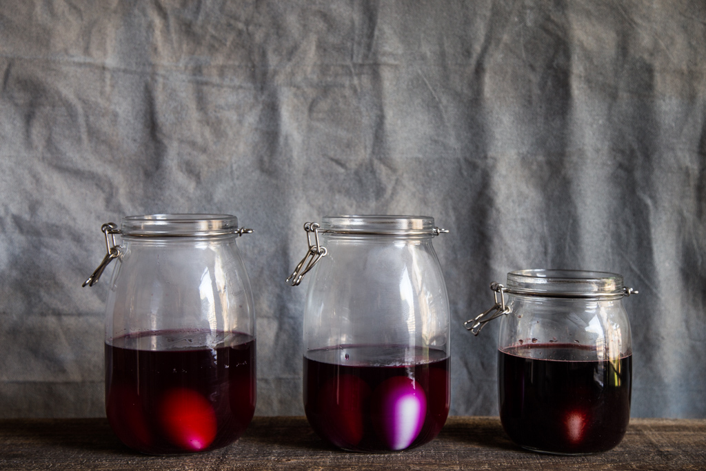 Naturally dyed eggs made with black rice creates the most beautiful dark purple color! Get the DIY instructions at FakeFoodFree.com.