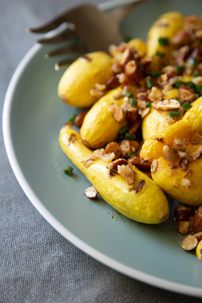 Vegetarian summer grilling with a recipe for Grilled Baby Yellow Squash with Smoked Almond and Garlic Crumble | FakeFoodFree.com