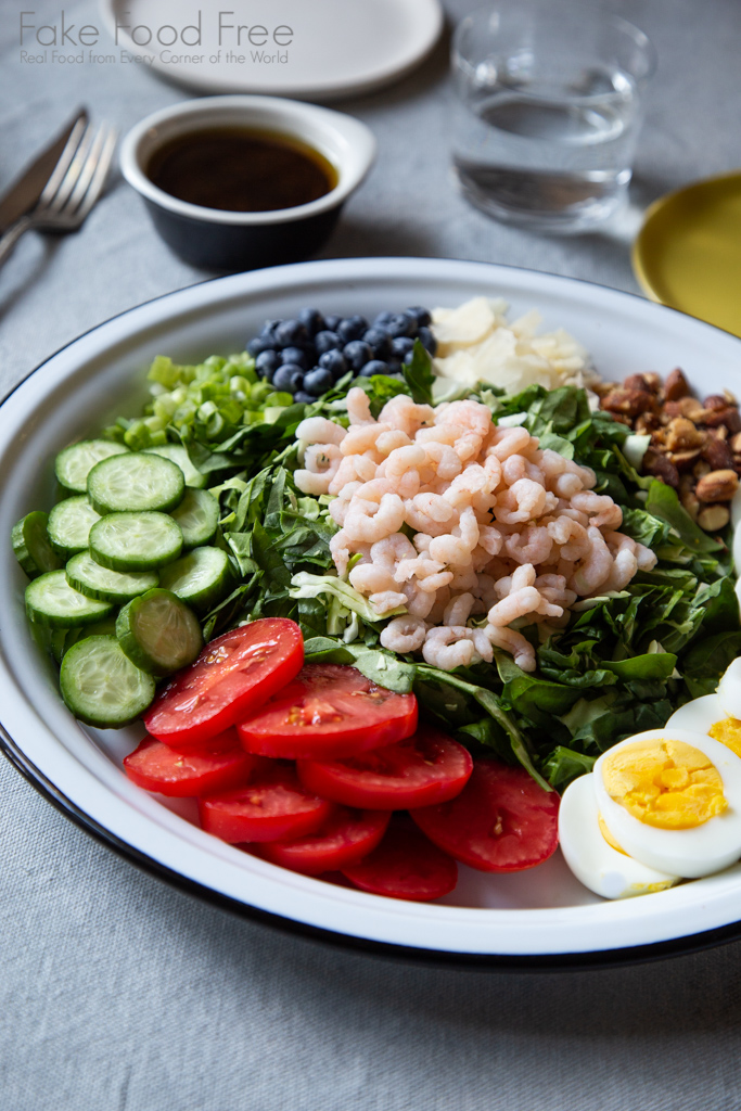 Shrimp cobb salad recipe with garden tomatoes and blueberries. 