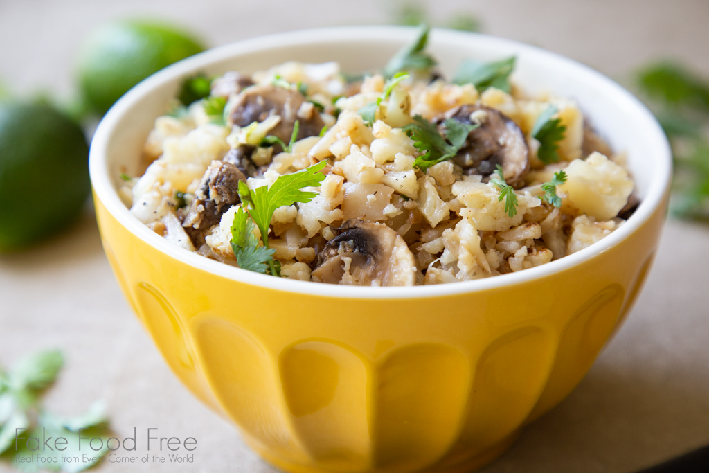 A vegetarian side dish recipe of cauliflower, mushrooms, cilantro and lime. Find it at FakeFoodFree.com