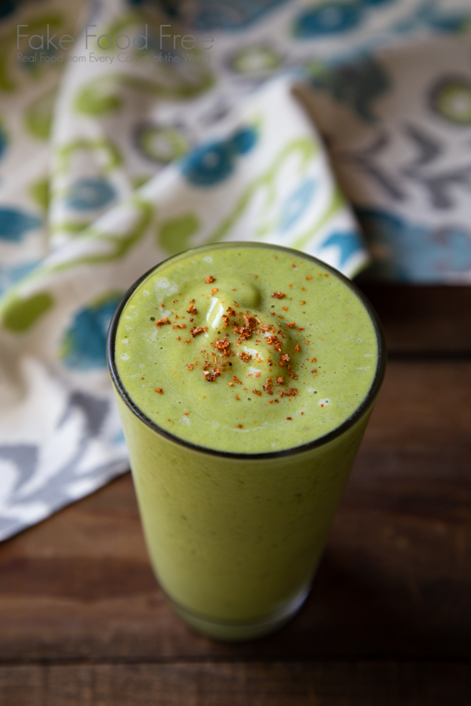 A protein shake recipe made with honeydew melon, mango, pineapple, spinach, and Tajin. 