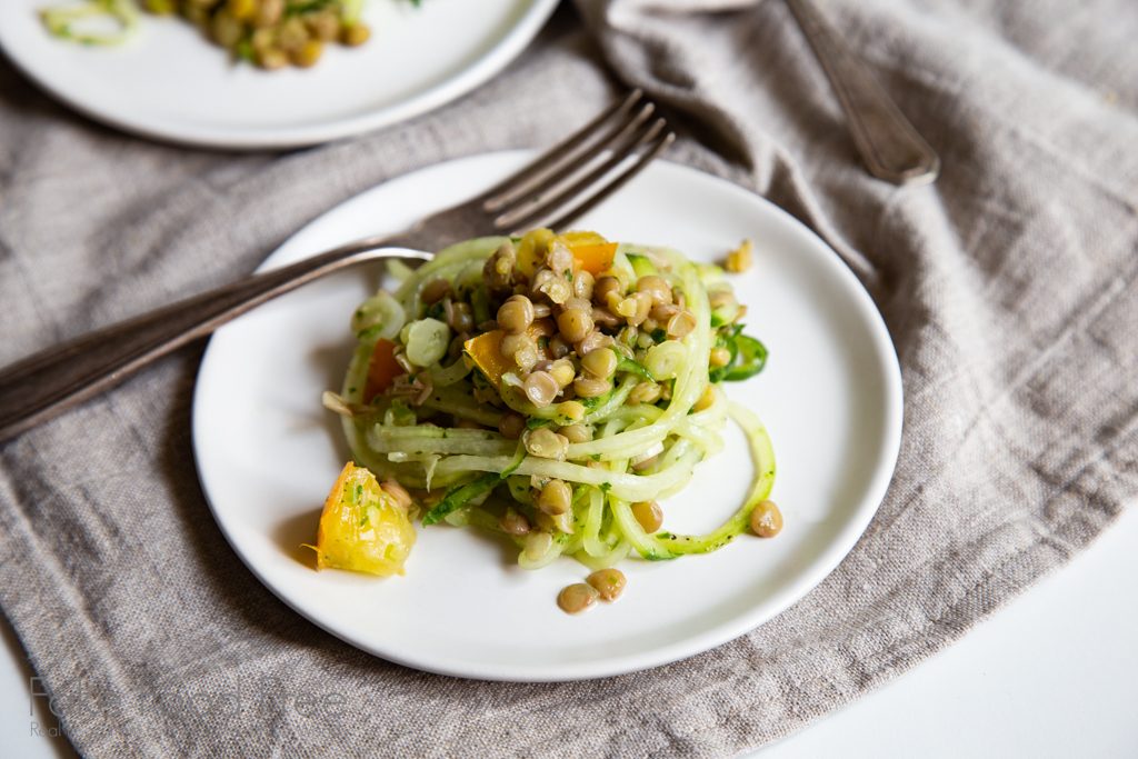 An easy lentil salad with spiralized cucumbers, yellow tomatoes and cilantro dressing. #lentils #healthysalads #healthyrecipes