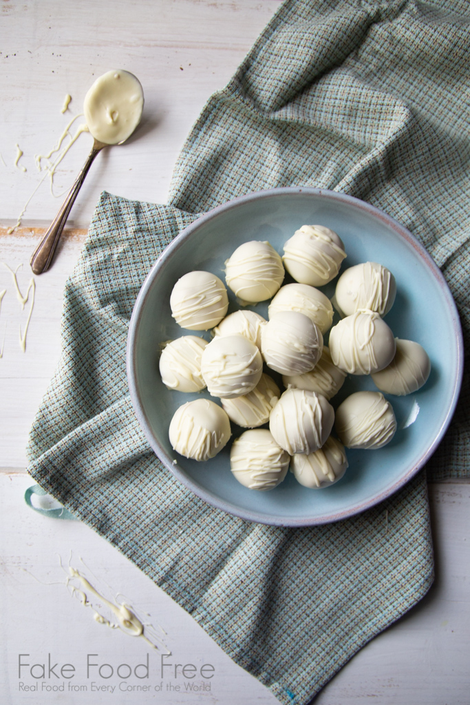 Recipe for peanut butter balls with pumpkin, spices and white chocolate | FakeFoodFree.com #candyrecipes #homemadecandy #holidays #holidayrecipes #peanutbutter #pumpkin #pumpkinspice