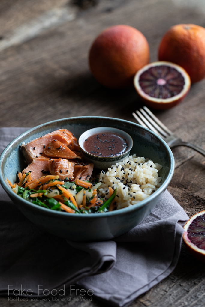 A healthy, comforting meal with hot smoked salmon, greens, rice and blood orange dressing. #healthyrecipes #healthyeating #smokedsalmon #simplemeals #smokedsalmonrecipes #bloodoranges #bloodorangerecipes