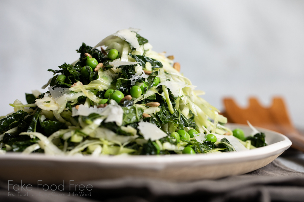 Cruciferous salad recipe made with kale, cabbage, and fresh peas. | FakeFoodFree.com #saladrecipes #saladideas #healthyeating #healthyrecipes
