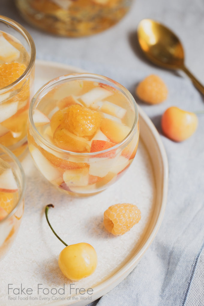 Golden Sangria Recipe | FakeFoodFree.com #wine #whitewine #cocktails #sangriarecipes #sangriaideas #yellowcherries #goldenraspberries